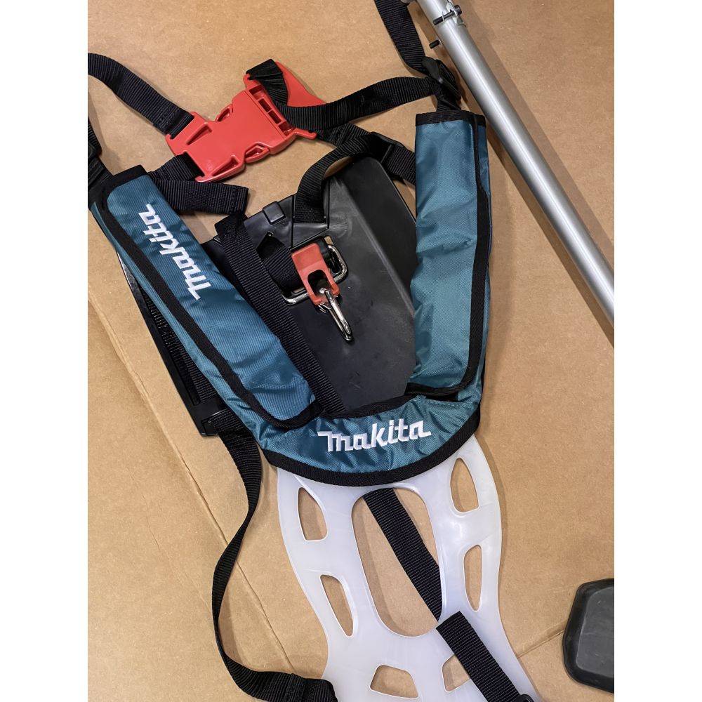 Аккумуляторный триммер Makita UR002GZ05, 40 В, 6500 об/мин, без АКБ и ЗУ (УЦЕНЕННЫЙ ТОВАР) (UR002GZ05/U)