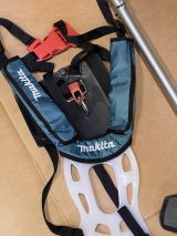 Аккумуляторный триммер Makita UR002GZ05, 40 В, 6500 об/мин, без АКБ и ЗУ (УЦЕНЕННЫЙ ТОВАР) (UR002GZ05/U)