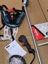 Аккумуляторный триммер Makita UR002GZ05, 40 В, 6500 об/мин, без АКБ и ЗУ (УЦЕНЕННЫЙ ТОВАР) (UR002GZ05/U)