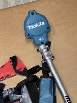 Аккумуляторный триммер Makita UR002GZ05, 40 В, 6500 об/мин, без АКБ и ЗУ (УЦЕНЕННЫЙ ТОВАР) (UR002GZ05/U)
